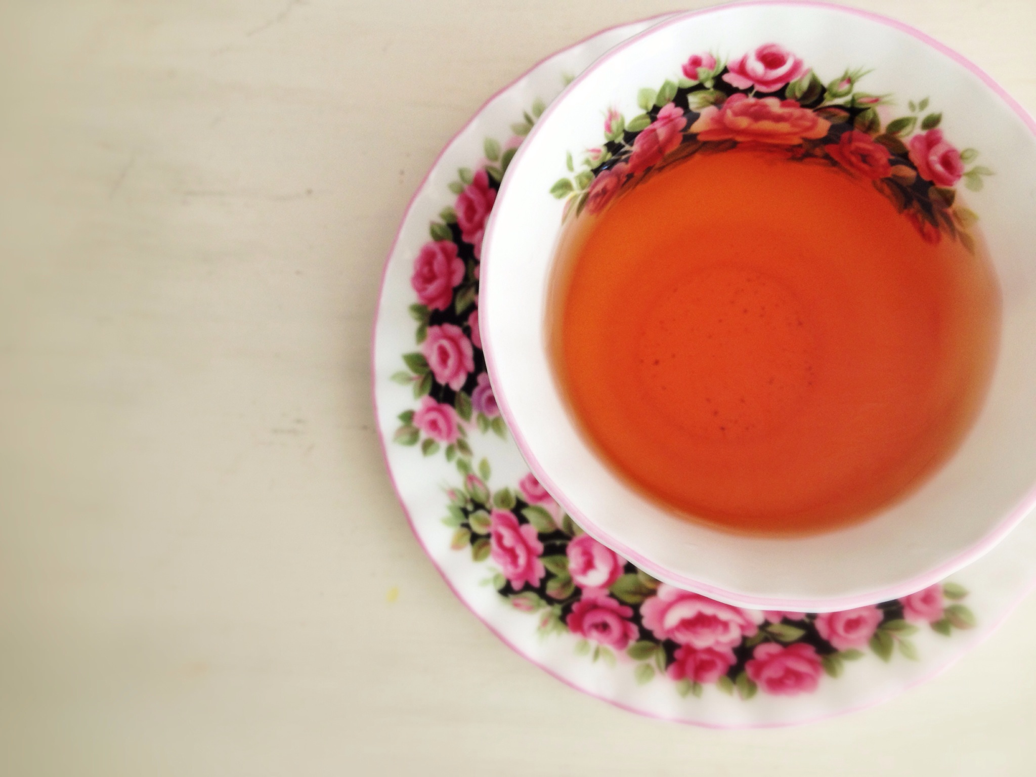 cup of tea in floral tea cup 